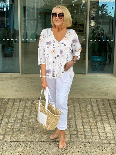 Anora – Elegant blomsterblush