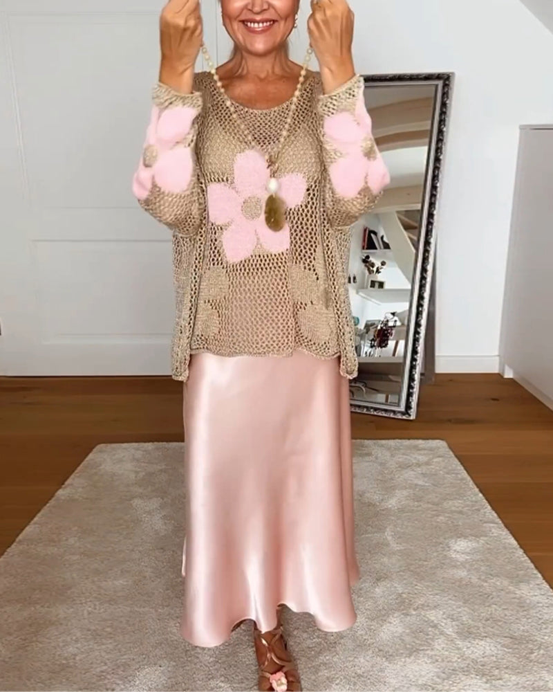 Afslappet blomsteret rundhalset langærmet hultrøje